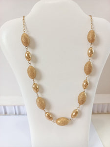 Collana palline ovali